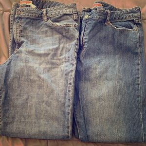 Two pairs of women’s gap curvy low rise jeans.